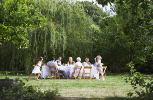 family enjoying landscaped garden