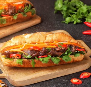 Pickling, Relish & Pantry Peppers from the Garden used on a sandwich